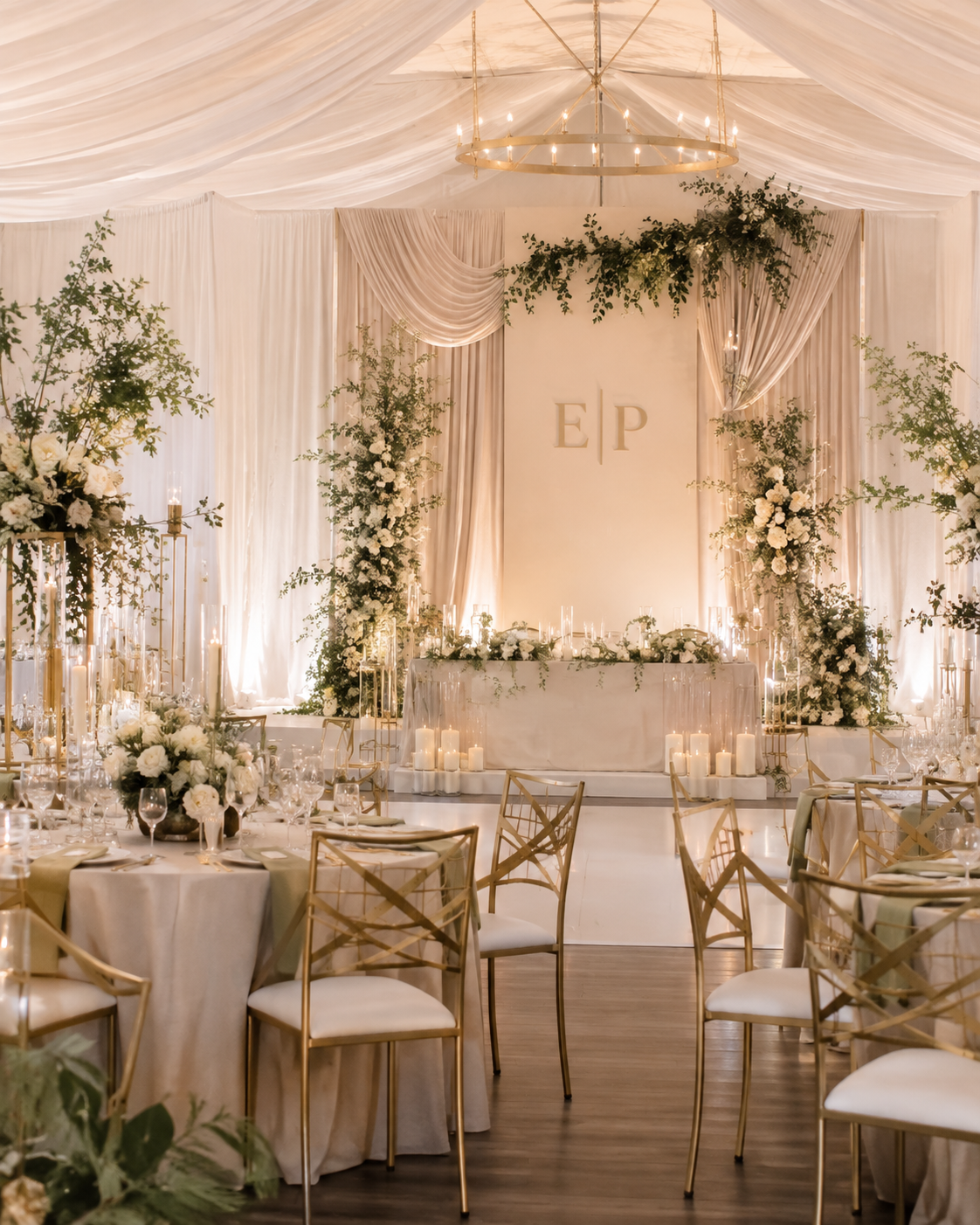 Wedding reception styling with draped backdrop